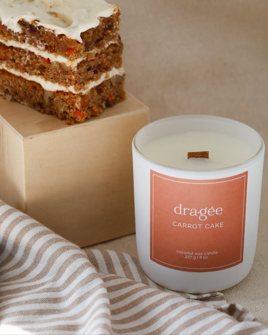 Carrot Cake coconut wax gourmand scented candle with wood wick in glass white matte jar by Dragée Candle Company.