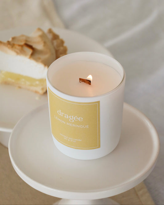 Lemon Meringue coconut wax gourmand scented candle with wood wick in glass white matte jar by Dragée Candle Company.