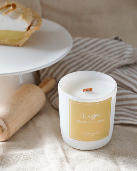 Lemon Meringue coconut wax gourmand scented candle with wood wick in glass white matte jar by Dragée Candle Company.